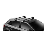 Thule WingBar Edge roof rack in black on a bare roof